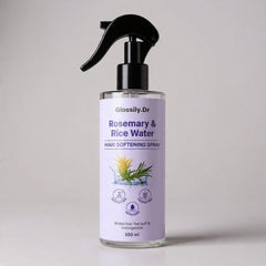Glossily Dr. Rosemary & Rice Water hair softening spray bottle on a light gray background